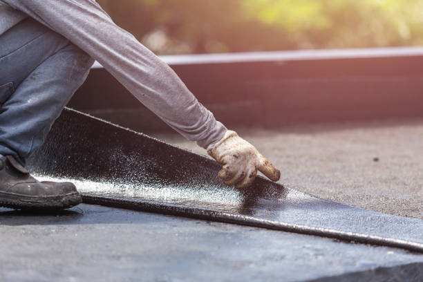 Professional Emergency Waterproofing technician working in White Cloud, MI